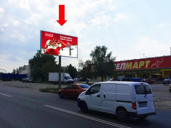 Фото рекламной плоскости по адресу Тракторостроителей пр., 57, супермаркеты "Велмарт", "Сильпо", "Фокстрот", ТРЦ "Украина", в сторону Салтовское шоссе