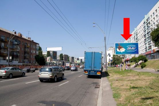 Фото рекламної площини за адресою Победы пр., 20 / Шолуденка ул., из центра