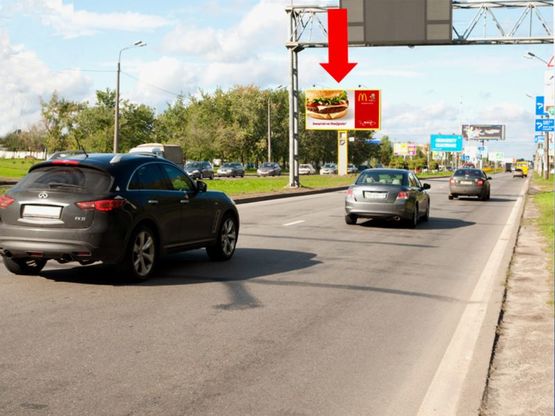 Фото рекламної площини за адресою Богатырская ул. / Полярная ул., разделитель, возле "Эпицентра", из центра