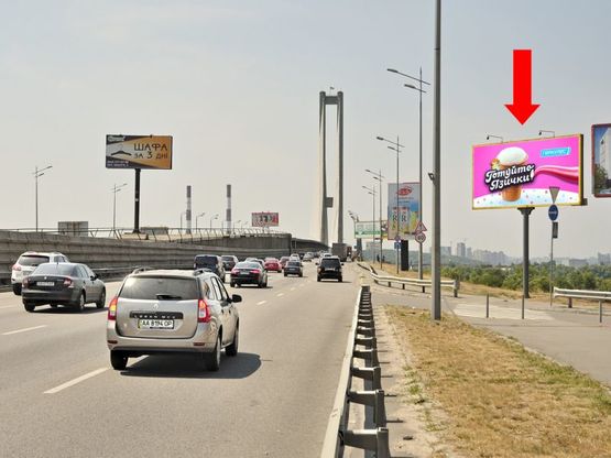 Фото рекламной плоскости по адресу Бажана пр., 150м. до Южного моста, в сторону правого берега