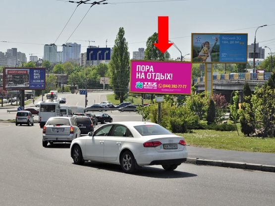 Фото рекламной плоскости по адресу Воздухофлотский пр., съезд на Победы пр., за мостом, напротив "Ощадбанк", в сторону ст. м. "Политехнический институт"