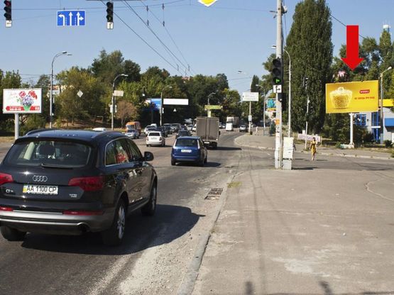 Фото рекламной плоскости по адресу Луговая ул., напротив ТРЦ "Караван", в сторону Ивашкевича ул.