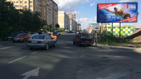 Фото рекламної площини за адресою Высоцкого-Сахарова #2А