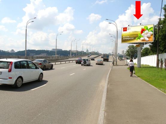 Фото рекламной плоскости по адресу Набережно-Рыбальская ул., 130м до мост Гаванский, в сторону Набережно-Крещатикская ул.