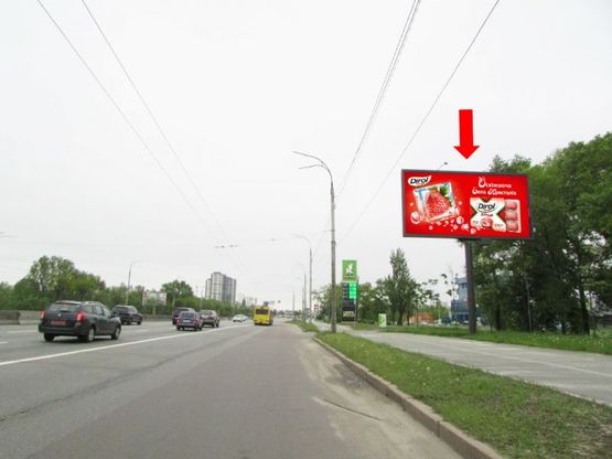 Фото рекламной плоскости по адресу Ватутина пр., 2, возле ТРЦ Sky Mall, перед АЗС Окко, из центра