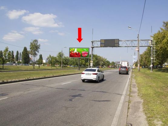 Фото рекламної площини за адресою Богатырская ул., 5 - ул. Полярная,  200 м до светофора, разделитель, в сторону супермаркетов "Эпицентр", "Сильпо", из центра