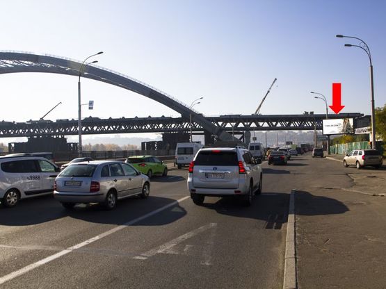 Фото рекламної площини за адресою Набережно-Рыбальская ул., перед Подольско-Воскресенским мостом, в сторону Подола Фото рекламної площини за адресою Набережно-Рыбальская ул., перед Подольско-Воскресенским мостом, в сторону Подола