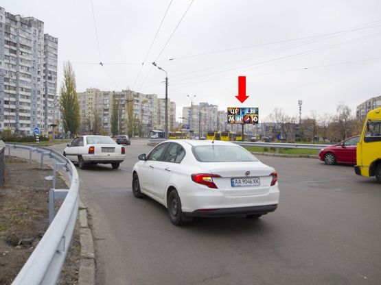 Фото рекламної площини за адресою Маяковского пр. 61/9 - ул. Лифаря, на круговой развязке, в сторону пр. Ватутина