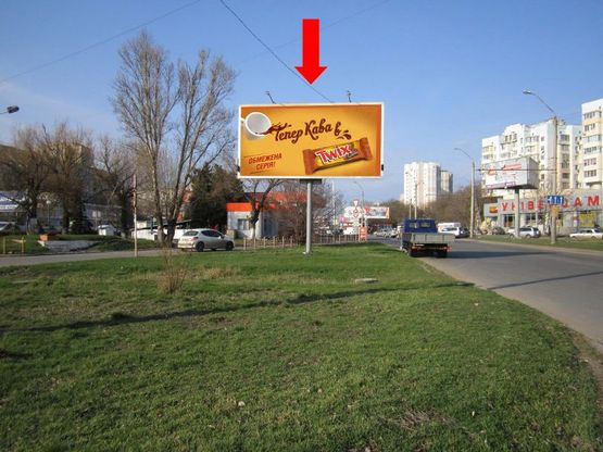 Фото рекламной плоскости по адресу Небесной Сотни пр. (бывш. Жукова пр.) / Левитана ул., возле супермаркета "Копейка", в центр