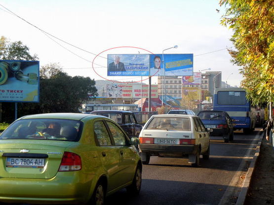 Фото рекламной плоскости по адресу Хмельницького (в’їзд в місто ринок "Галицьке перехрестя"))лівий Фото рекламной плоскости по адресу Хмельницького (в’їзд в місто ринок "Галицьке перехрестя"))лівий