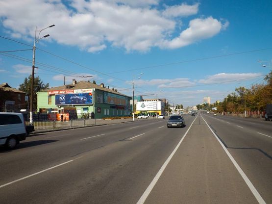 Фото рекламной плоскости по адресу пр-т. Слобожанський - вул. Новоселівська, з центру, призма 12х3 Фото рекламной плоскости по адресу пр-т. Слобожанський - вул. Новоселівська, з центру, призма 12х3