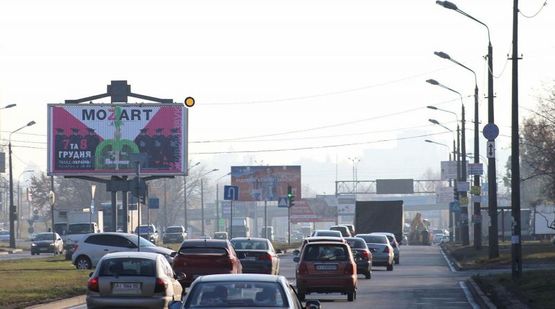 Фото рекламної площини за адресою Богатырская ул. 3, завод "Оболонь", разделитель, к м.Почайна Фото рекламної площини за адресою Богатырская ул. 3, завод "Оболонь", разделитель, к м.Почайна
