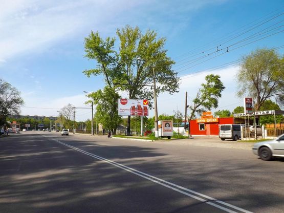 Фото рекламної площини за адресою Запорізьке шосе, розвилка, автостоянка Фото рекламної площини за адресою Запорізьке шосе, розвилка, автостоянка