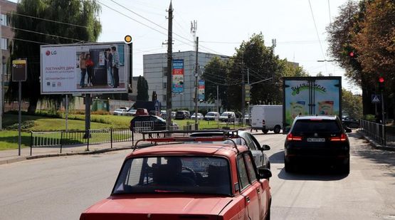 Фото рекламной плоскости по адресу Зеленая ул. 186 / Бузковая ул., из центра