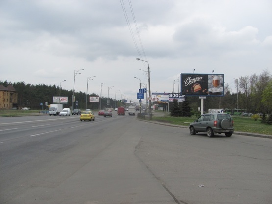 Фото рекламной плоскости по адресу Братиславская ул., 42 - просп. Лесной (АЗС "ТНК", сьезд с ул. Академика Курчатова на ул. Братиславскую, в направлении просп. Ватутина Ген.)