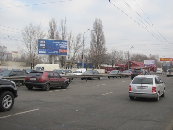 Фото рекламної площини за адресою Луговая ул., 13 напротив ТЦ "Караван", АЗС "Золотой гепард", АЗС "Socar", по направлению Оболони), призма Фото рекламної площини за адресою Луговая ул., 13 напротив ТЦ "Караван", АЗС "Золотой гепард", АЗС "Socar", по направлению Оболони), призма