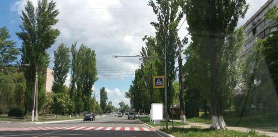 Фото рекламной плоскости по адресу Ул. Шолуденко, перед остановкой "Сушиленд"