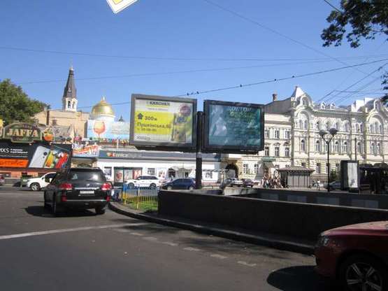 Фото рекламной плоскости по адресу Привокзальная площадь / ул. Пантелеймоновская (возле "Макдональдз") (скролл права) Фото рекламной плоскости по адресу Привокзальная площадь / ул. Пантелеймоновская (возле "Макдональдз") (скролл права)
