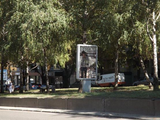 Фото рекламной плоскости по адресу пр.О.Поля, 12/пр. Кирова, 12