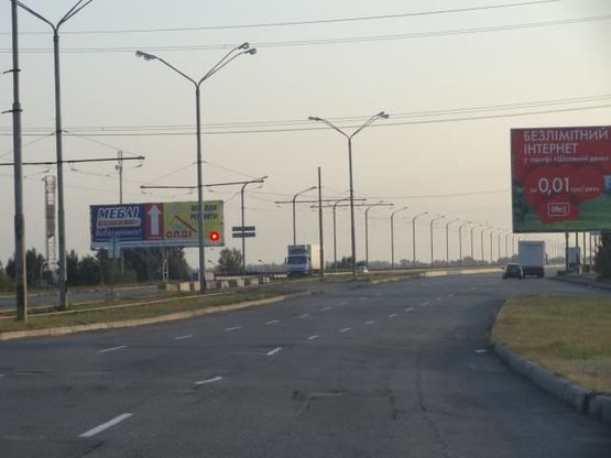 Фото рекламної площини за адресою Кайдакський міст/Кайдакский мост, поток движения на левый берег, в сторону ТЦ Караван