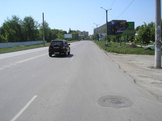 Фото рекламной плоскости по адресу Хмельницьке шосе між фірмою “Омега” та АТП16861 Фото рекламной плоскости по адресу Хмельницьке шосе між фірмою “Омега” та АТП16861