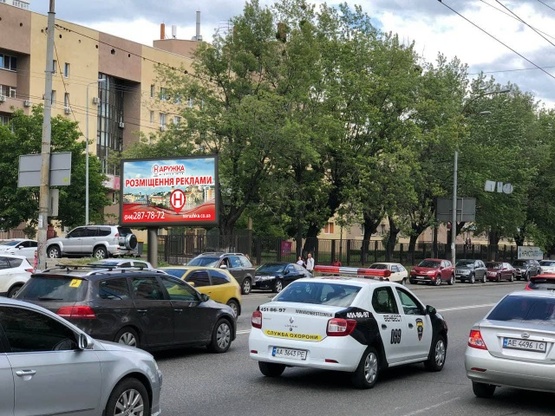 Фото рекламной плоскости по адресу Ул. Лобановского, 9. Выезд на Севастопольскую площадь. Напротив  супермаркета NOVUS Фото рекламной плоскости по адресу Ул. Лобановского, 9. Выезд на Севастопольскую площадь. Напротив  супермаркета NOVUS