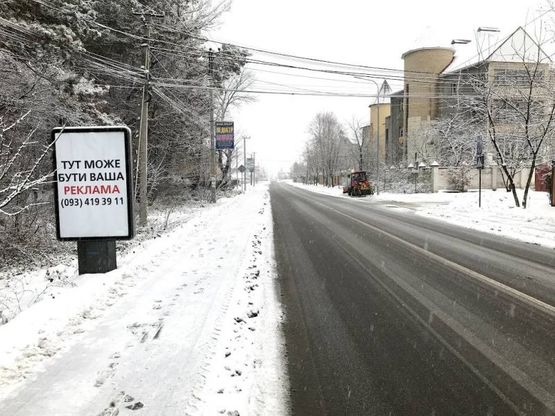 Фото рекламной плоскости по адресу Ул. Пушкина , возле поворота на ул. Борщаговская