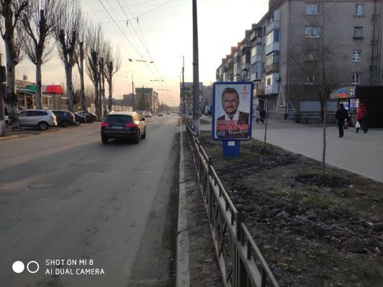 Фото рекламної площини за адресою ул. Первомайская, район пиццерии Челентано Фото рекламної площини за адресою ул. Первомайская, район пиццерии Челентано