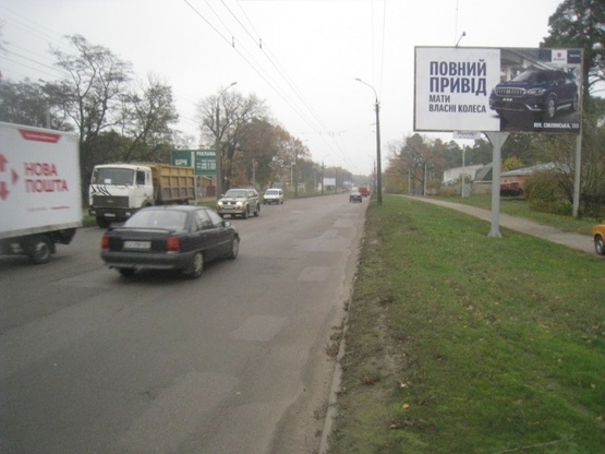 Фото рекламной плоскости по адресу Дахновская ул., 4 (рядом Больница №2, супермаркет, боулинг-цент, гостиница), направл. к центру города