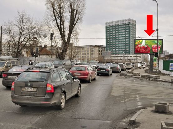 Фото рекламної площини за адресою Короленковская ул., 6, на светофоре, поворот на супермаркет "Мегамаркет", в сторону Деловая ул. (бывш. ул. Димитрова)