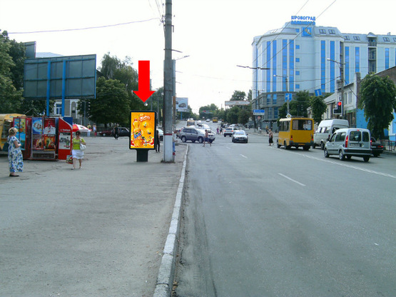 Фото рекламної площини за адресою Соборная ул. (бывш. 50-летия Октября ул.) / Б. Перспективная ул. (бывш. Маркса ул.), возле моста через р. Ингул, из центра