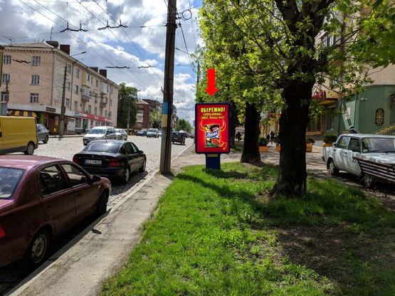 Фото рекламної площини за адресою Главная ул., 126, напротив Укрэксимбанка, из центра