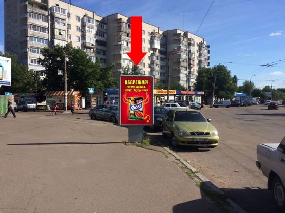 Фото рекламной плоскости по адресу Шевченко бул. / 700-летия Черкасс пл., возле супермаркета "Сильпо", из центра Фото рекламной плоскости по адресу Шевченко бул. / 700-летия Черкасс пл., возле супермаркета "Сильпо", из центра