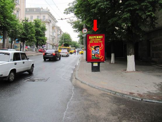 Фото рекламної площини за адресою Шевченко ул. / Б. Перспективная ул. (бывш. Маркса ул.), 32/34, возле магазина "Люкс"