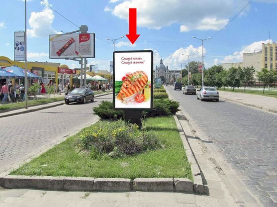 Фото рекламной плоскости по адресу Черновицкая ул., разделитель, в сторону ж/д вокзала