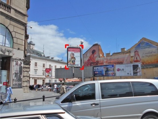 Фото рекламной плоскости по адресу пл. Міцкевича (біля Будинку Книги), місце 2