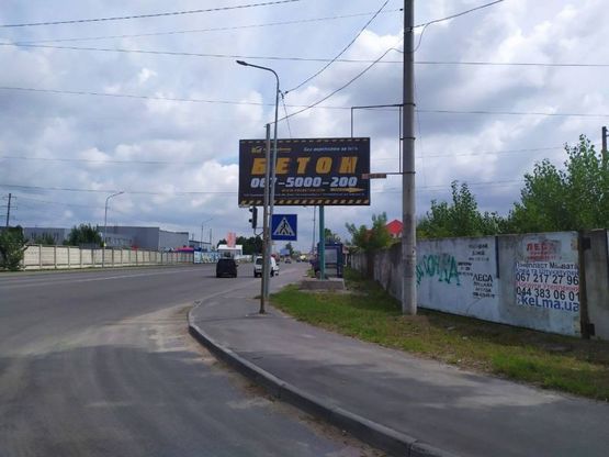 Фото рекламної площини за адресою с. Святопетровское, перекресток асфальтный завод