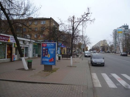 Фото рекламной плоскости по адресу г. Вишневое,перекресток ул. Европейская  магазин "Космо"