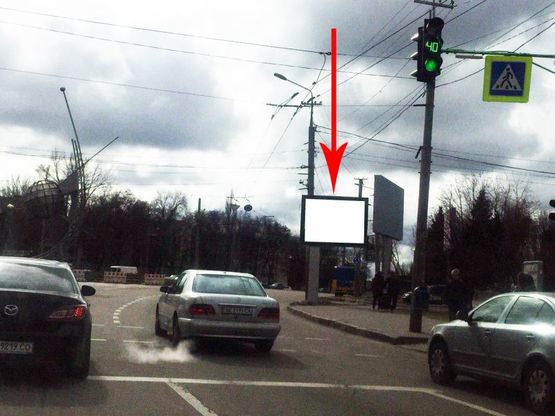 Фото рекламной плоскости по адресу t156A4,Запорізьке шосе, в районі буд. 4, біля ТРЦ "Дафі", на світлофорі