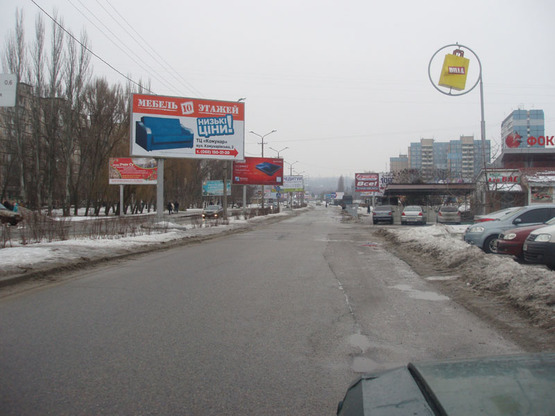 Фото рекламной плоскости по адресу Ул. Коммунаровская, Напротив 'биллы' И 'comfy', Рядом С 'макдональдс' Фото рекламной плоскости по адресу Ул. Коммунаровская, Напротив 'биллы' И 'comfy', Рядом С 'макдональдс'