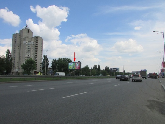 Фото рекламної площини за адресою Кільцева дорога (розподілювач) / Литвиненко-Вольгемут, рух в напрямку до Жулянського шляхопроводу