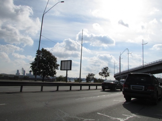 Фото рекламной плоскости по адресу Набережне шосе (за 500 метрів до Наводницького парку) по ходу від мосту Метро Фото рекламной плоскости по адресу Набережне шосе (за 500 метрів до Наводницького парку) по ходу від мосту Метро