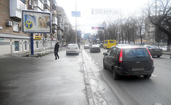 Фото рекламной плоскости по адресу Жилянская 64/62 Магазин Одежды "М Воронин" (А3) СКРОЛЛЕР
