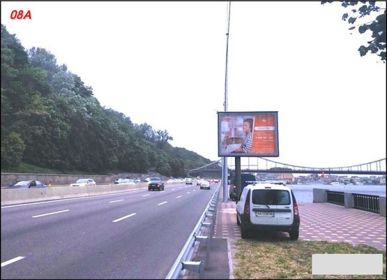 Фото рекламной плоскости по адресу Наб. шоссе, за Пешеходным мостом, к ст.м.Днепр
