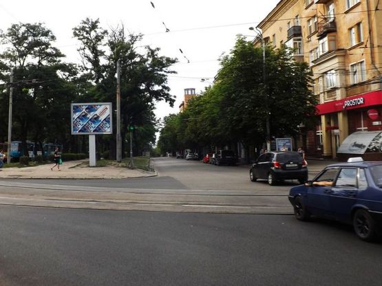 Фото рекламної площини за адресою пр.Д.Яворницького - Соборна площа/пр.К.Маркса - Октябрьская площадь, Национальный Политех
