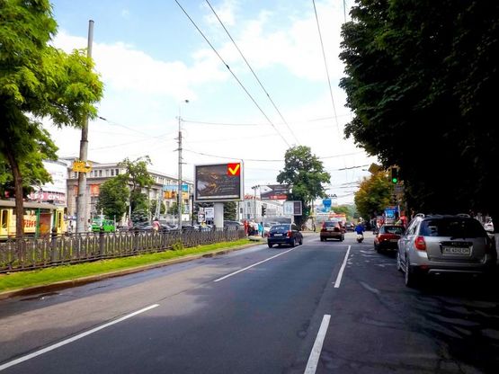 Фото рекламной плоскости по адресу пр-т. Д. Яворницького - вул. Короленка, ТЦ "Гранд Плаза", роллер 4х3/пр. К. Маркса - ул. Короленко, ТЦ "Гранд Плаза", роллер 4х3