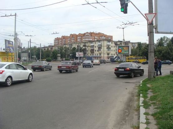 Фото рекламной плоскости по адресу Зигіна пл.(на трикутнику) з Зіньківська вул. Фото рекламной плоскости по адресу Зигіна пл.(на трикутнику) з Зіньківська вул.