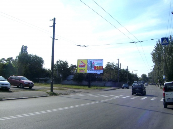 Фото рекламної площини за адресою Мануйловский просп. (Воронцова просп.), напротив дома №32, (Роддом №9, Приемная Амур-Нижнеднепровского района, Стадион Коминтерна), в направл. просп. Газеты "Правда"