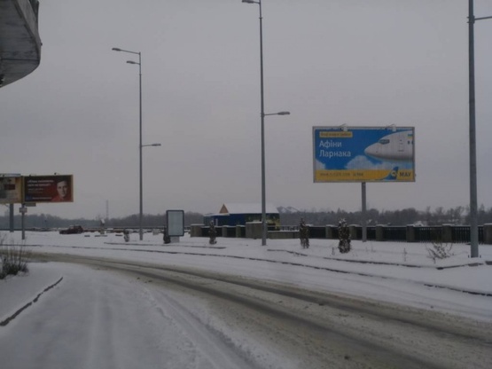 Фото рекламной плоскости по адресу Набережное шоссе, 25(М) "Днепр" (300м  от съезда с моста Метро в центр, за эстакадой)