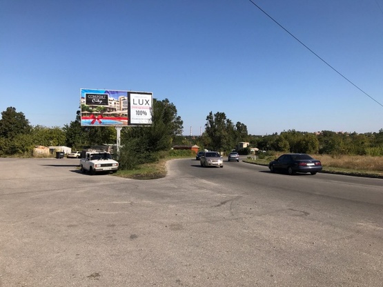 Фото рекламної площини за адресою Яснополянская ул., в напр. Южного моста, новой Объездной дороги (картинг-клуб, кафе "Шашлык")